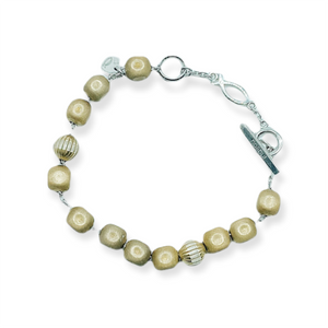 Silver bracelet with diamond gold beads